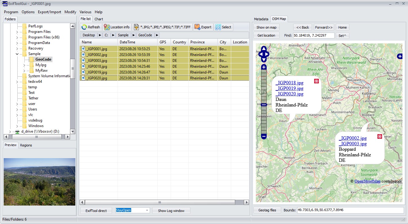 Главное окно ExifToolGUI с вкладкой OSM Map и геопривязанными файлами