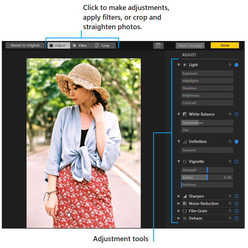Редактор Phototheca с вкладками Adjust, Filter, Crop и ползунками света, баланса белого, резкости и Dehaze