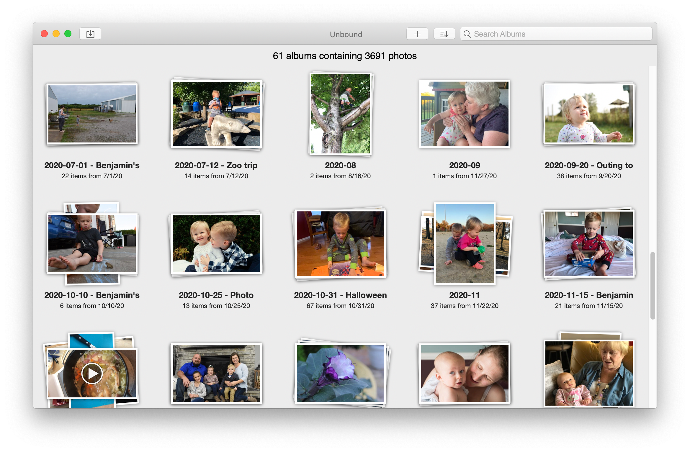 Главное окно Unbound со светлой сеткой альбомов и полем Search Albums